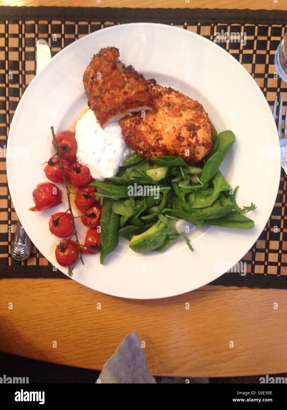 Lebanese chicken with yoghurt and greens Stock Photo Alamy