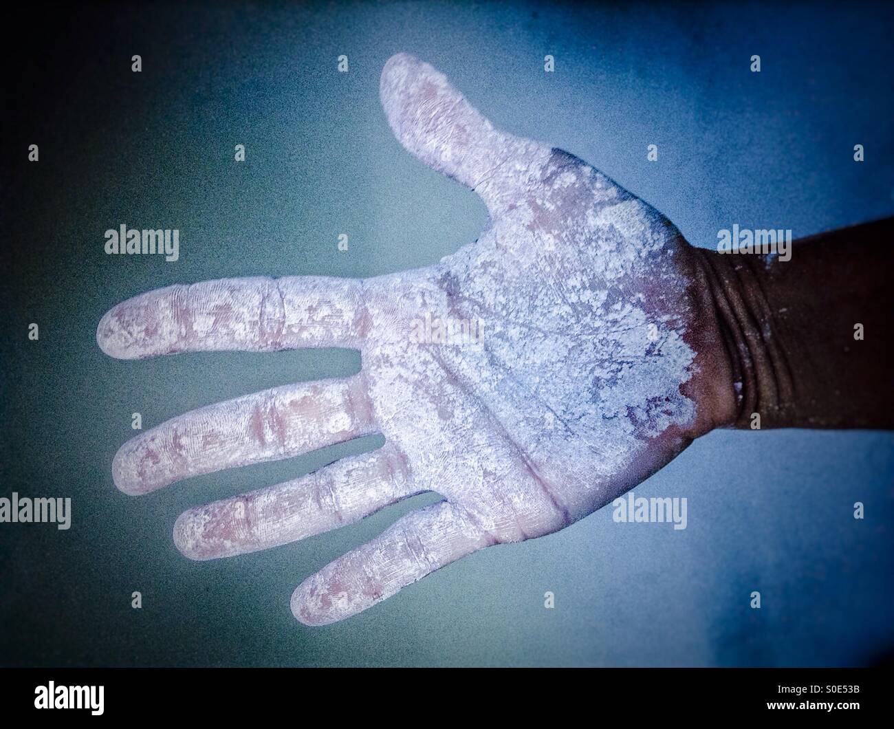 Open hand dirty with gluten free flour - Smartphone Captured Stock Image