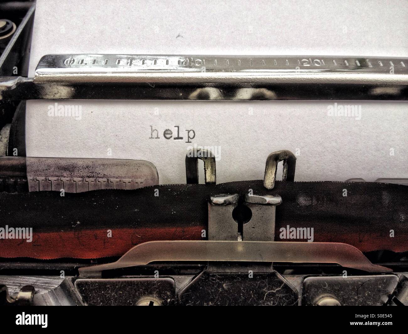 Help typed on a typewriter - Smartphone Captured Stock Image