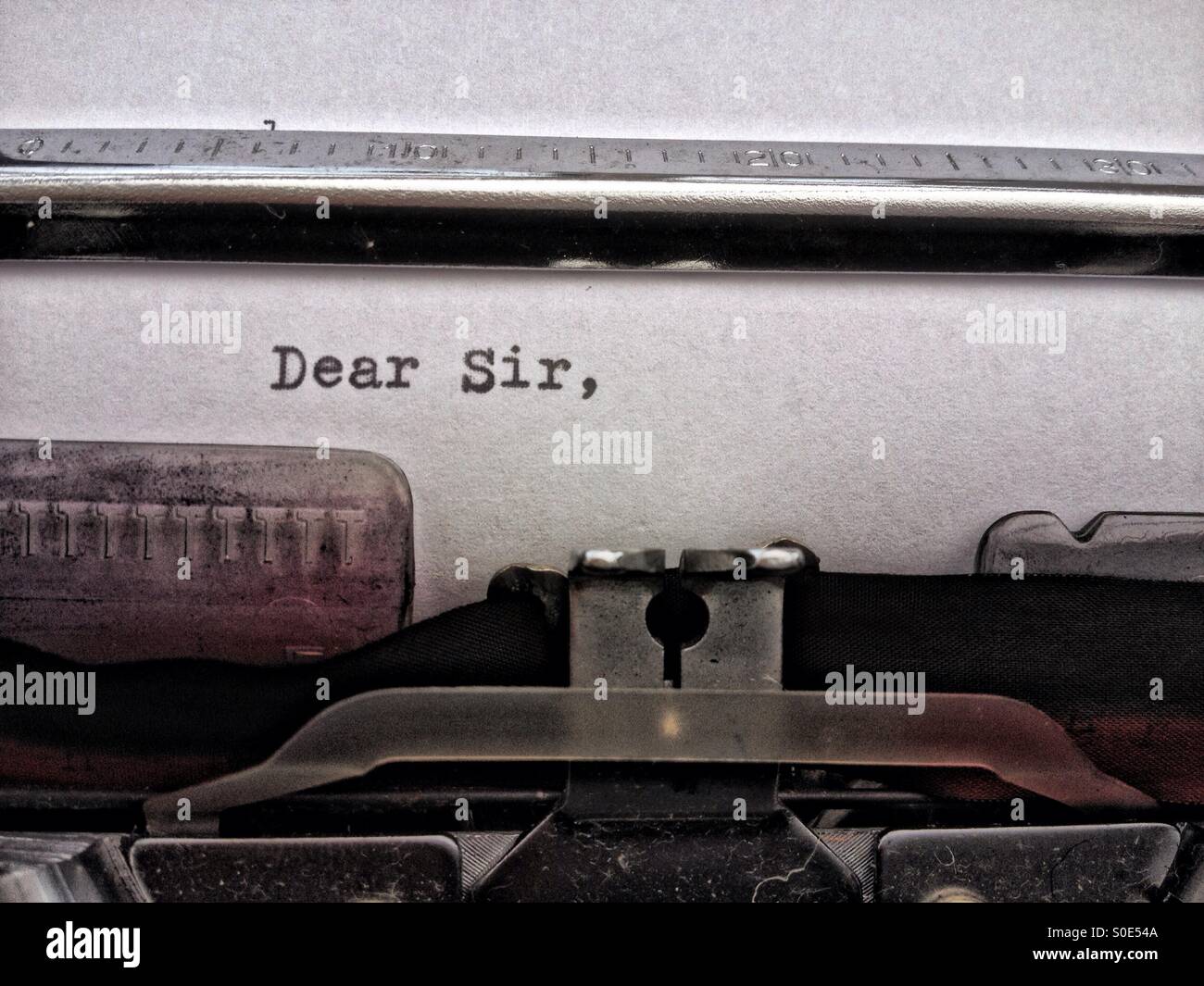 Dear sir typed on a typewriter Stock Photo