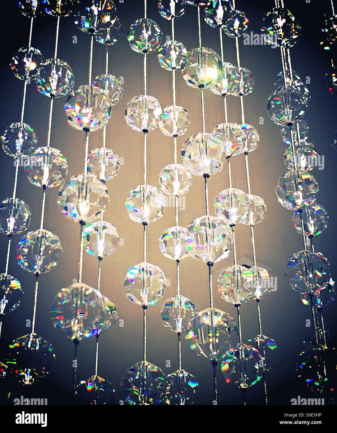 Crystals on cords in a curtain - Smartphone Captured Stock Image