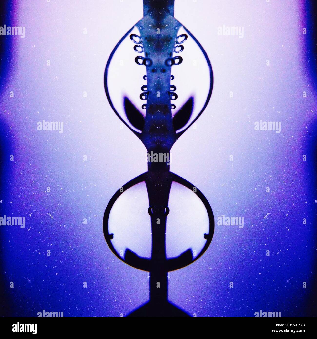 Symmetrical image of raindrops on a washing line - Smartphone Captured Stock Image