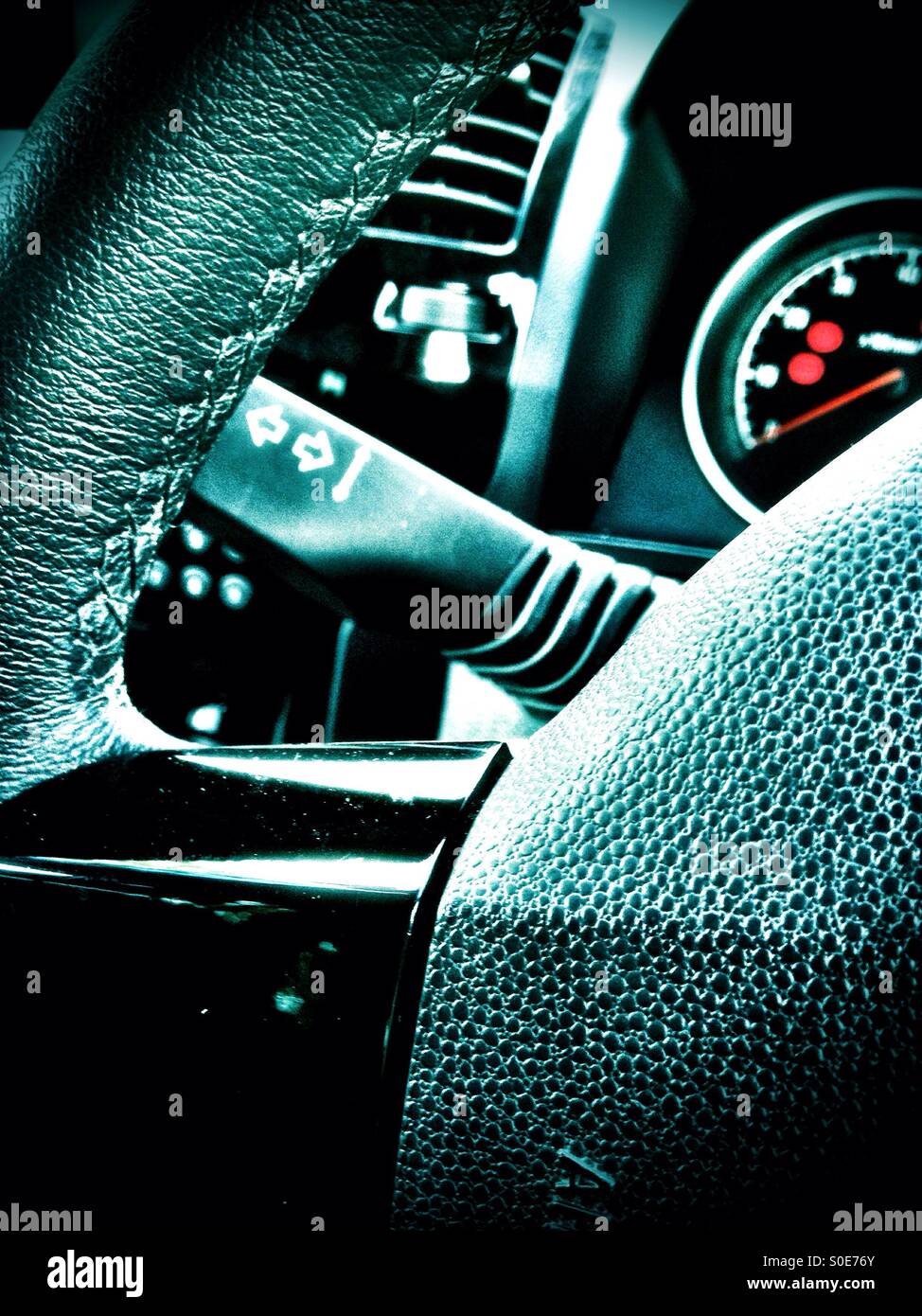 A car setting wheel an controls. - Smartphone Captured Stock Image