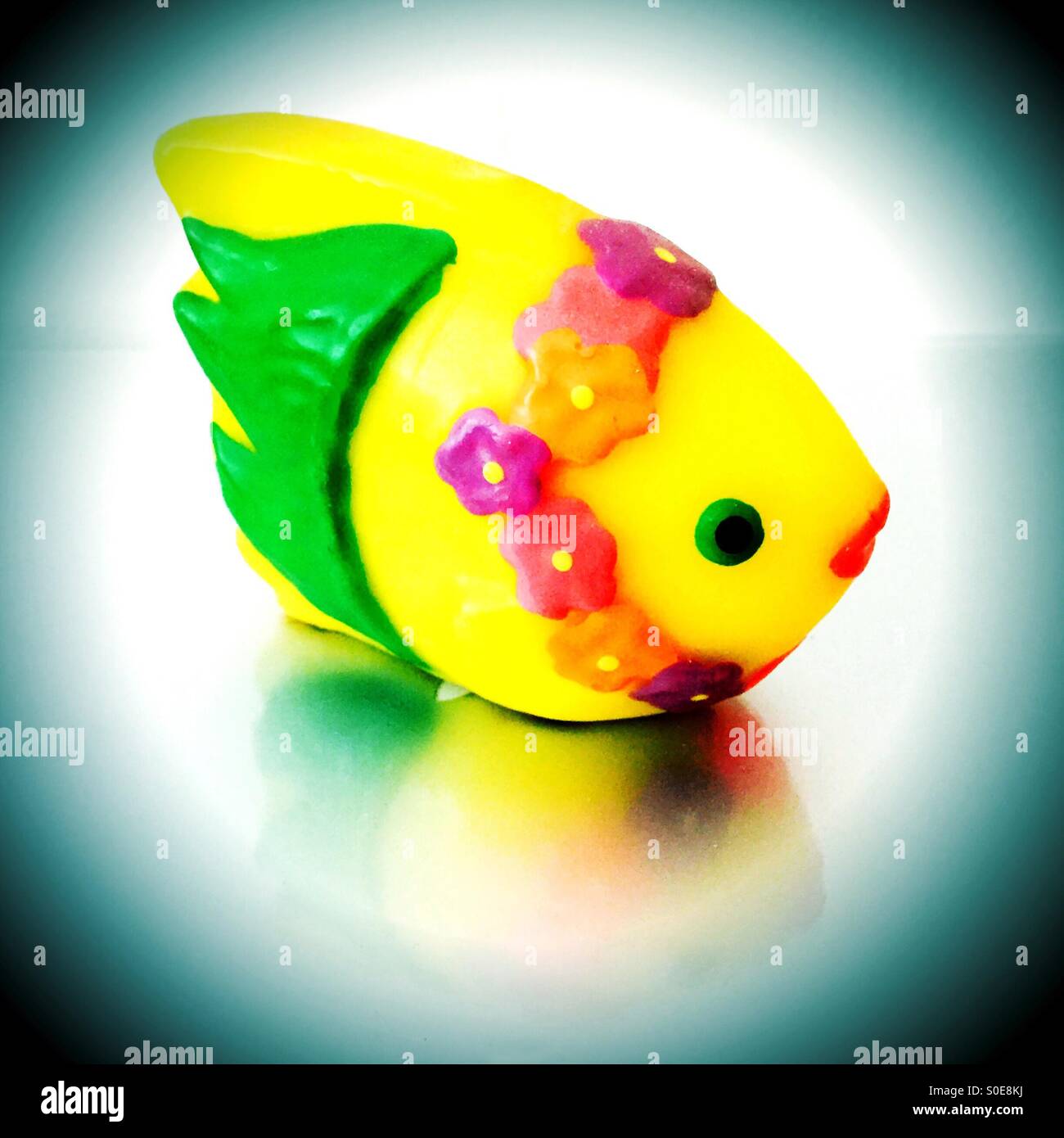 Vintage wax tropical fish in bowl - Smartphone Captured Stock Image