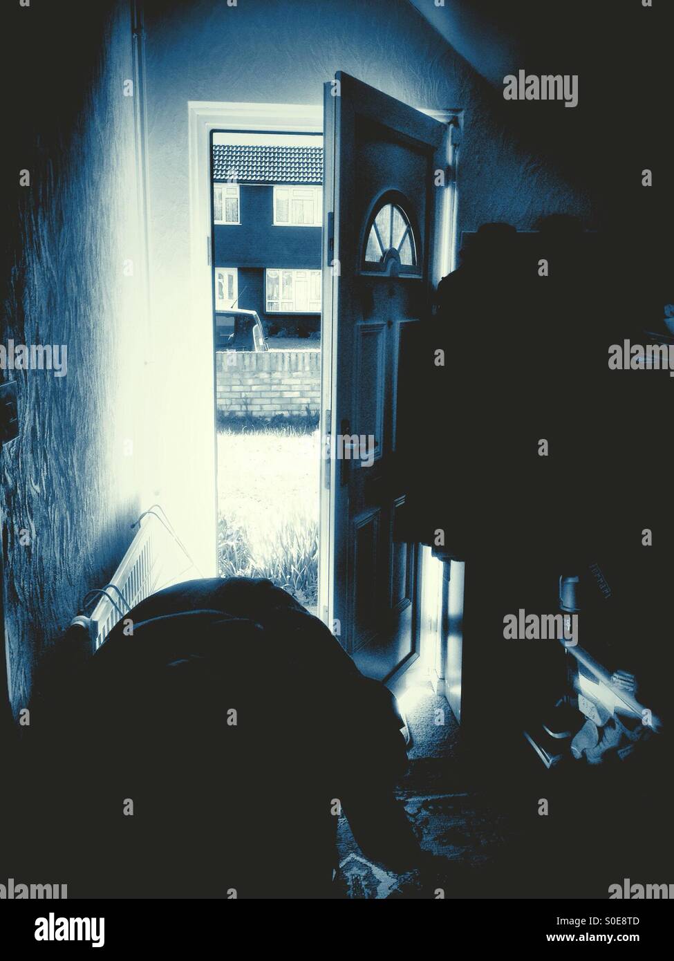 View out of the front door. - Smartphone Captured Stock Image