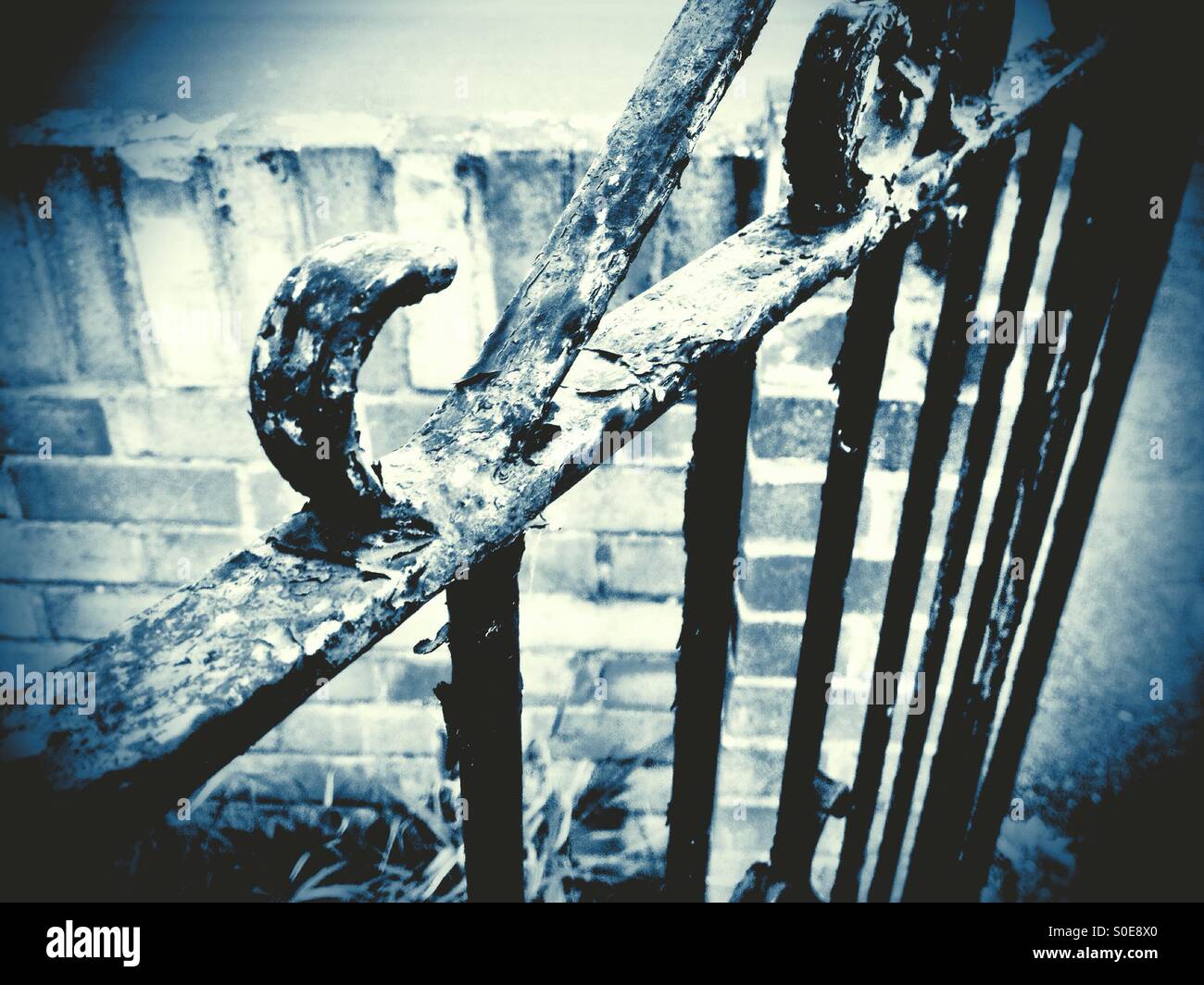 A rusty iron gate. - Smartphone Captured Stock Image