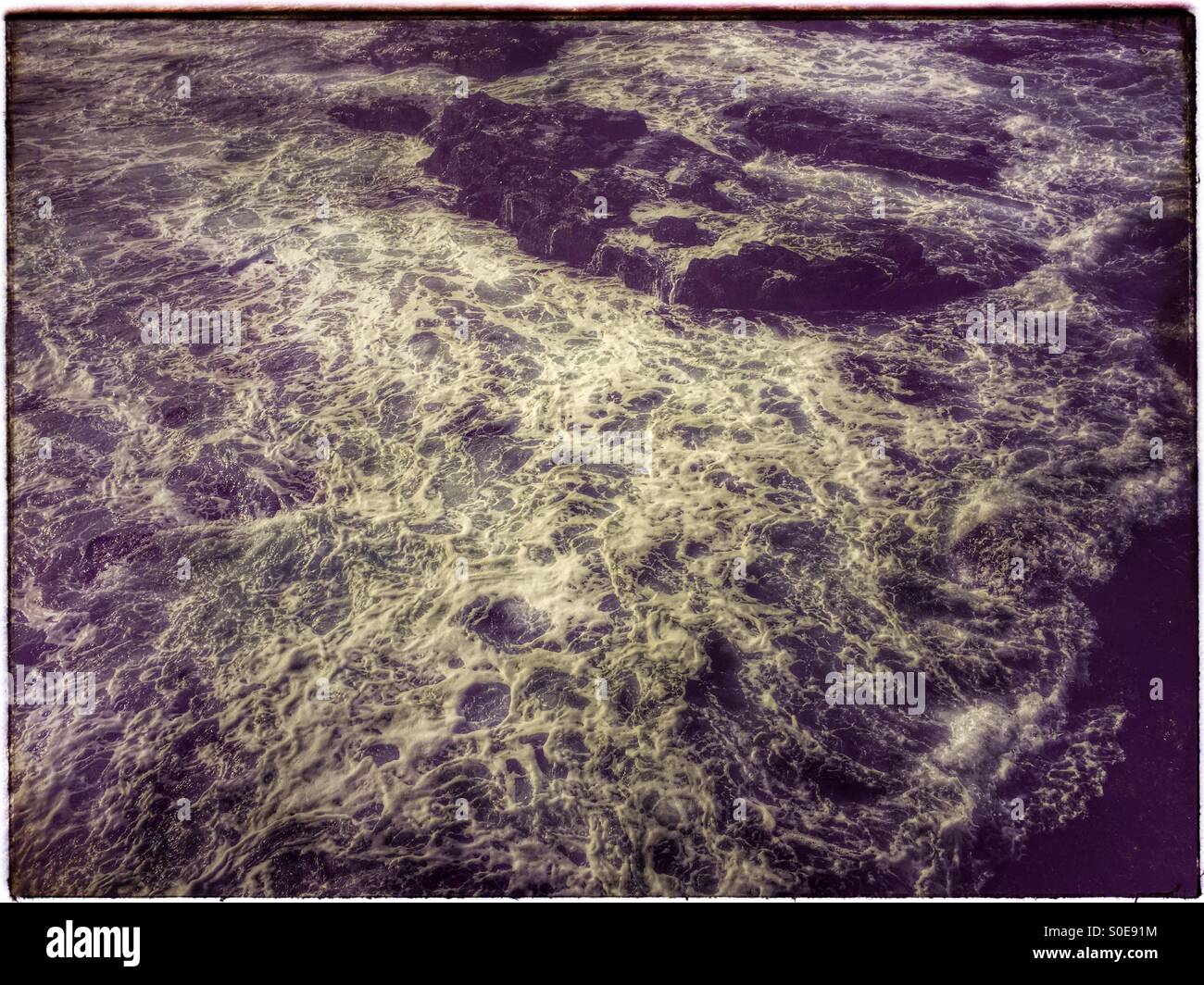 Waves breaking near shore at Seapoint, Cape Town. - Smartphone Captured Stock Image