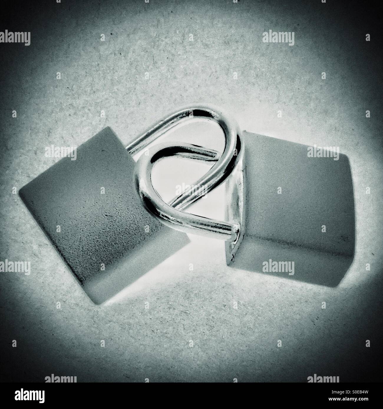 Two padlocks locked together - Smartphone Captured Stock Image