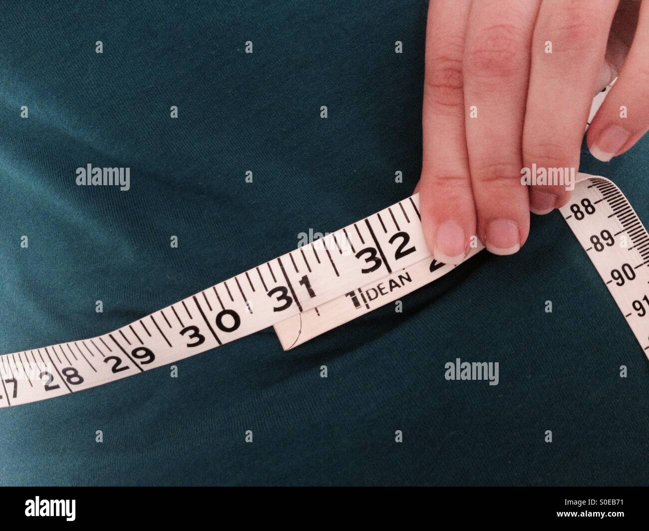 Tape measure waist hi-res stock photography and images - Alamy