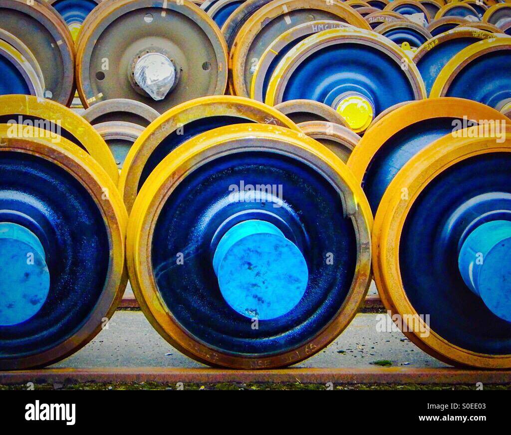 Blue and yellow railway carriage wheels - Smartphone Captured Stock Image