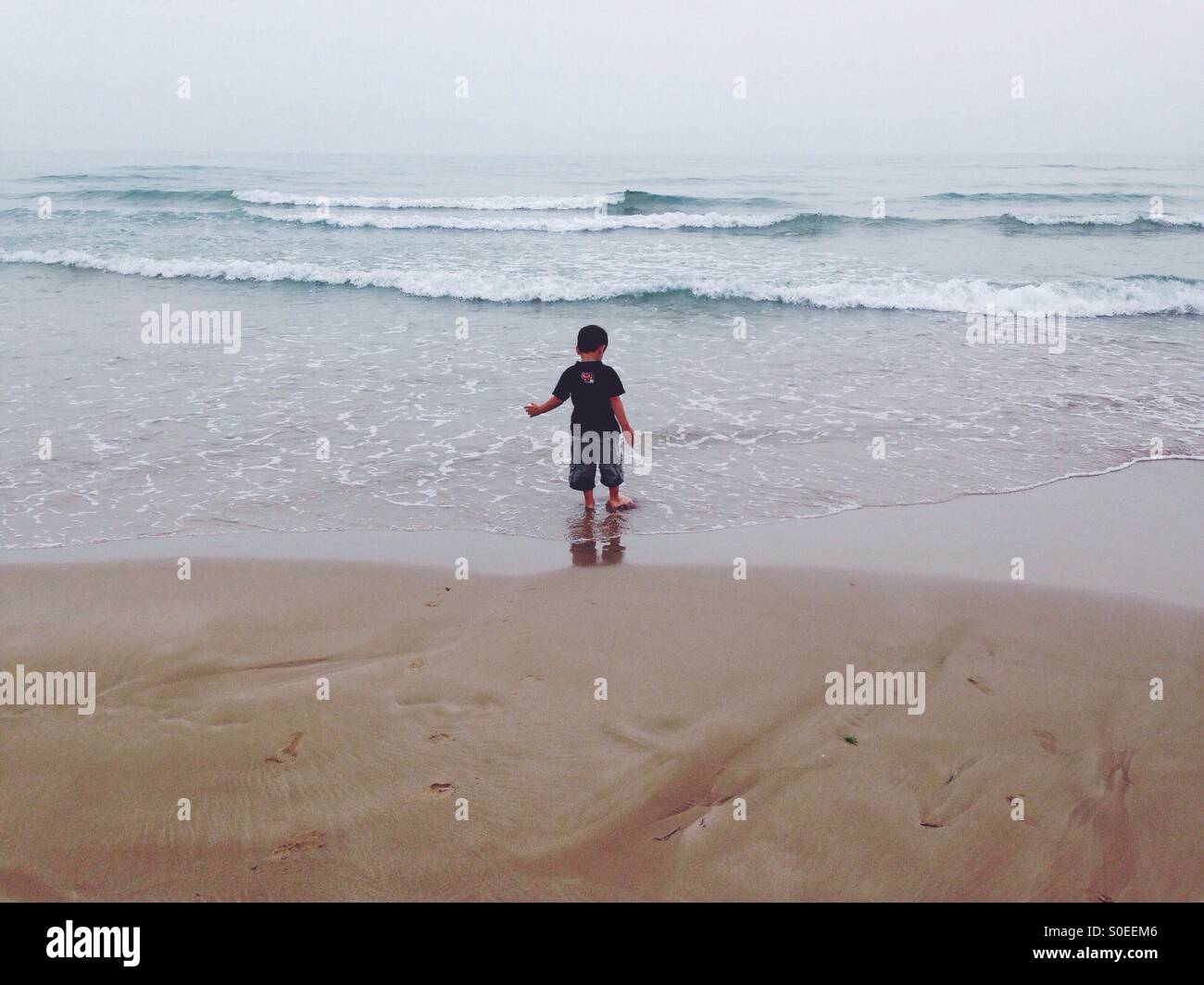 Boy in the beach Stock Photo