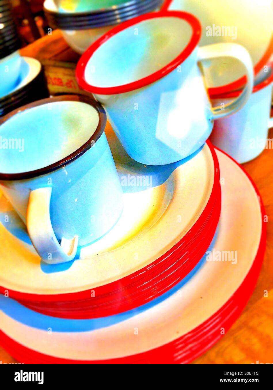 Dinnerware metal cups and plates Stock Photo Alamy