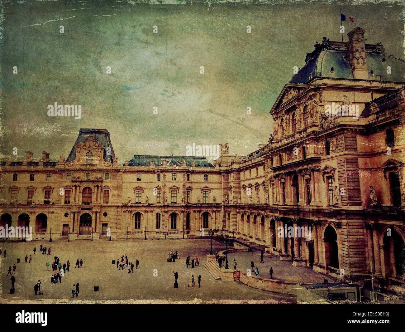 View of Musée du Louvre in Paris, France, taken from a second floor window. Tourists milling  below. Vintage texture overlay for aged, antique look. Stock Photo