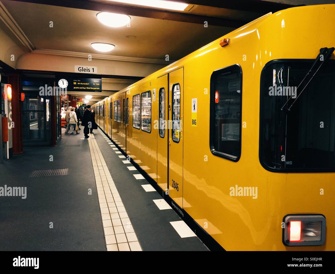 Yellow train in the subway Berlin Germany Stock Photo