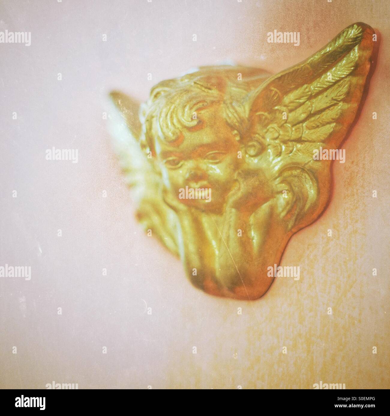 Putto golden angel - Smartphone Captured Stock Image