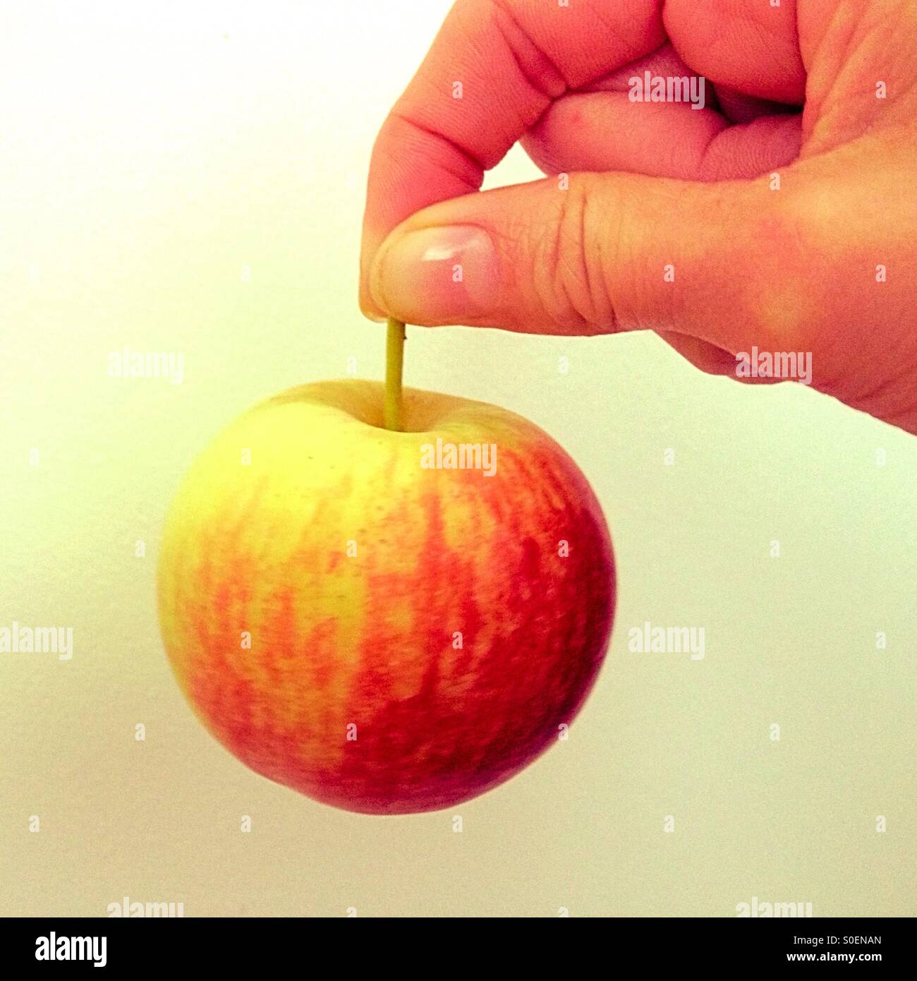 Holding an apple - Smartphone Captured Stock Image