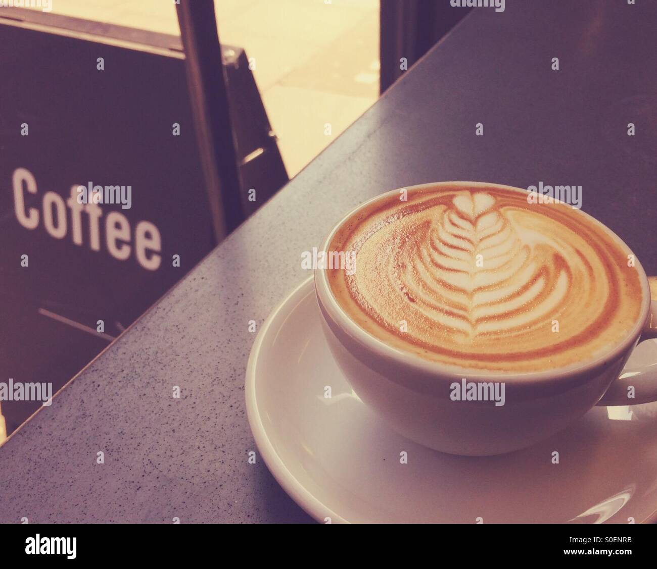 Latte and coffee sign Stock Photo Alamy