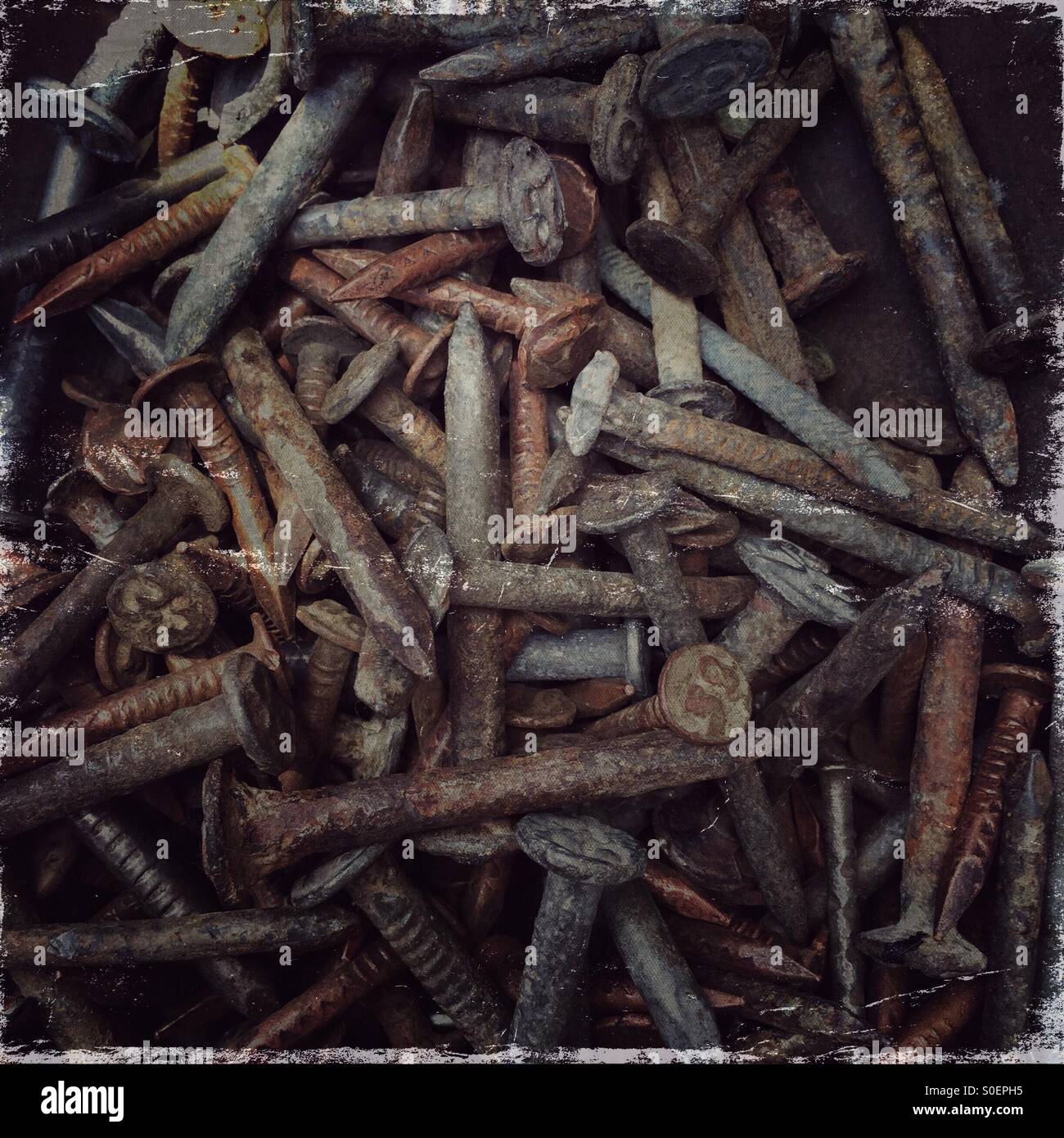 Many nails and screws in a pile - Smartphone Captured Stock Image
