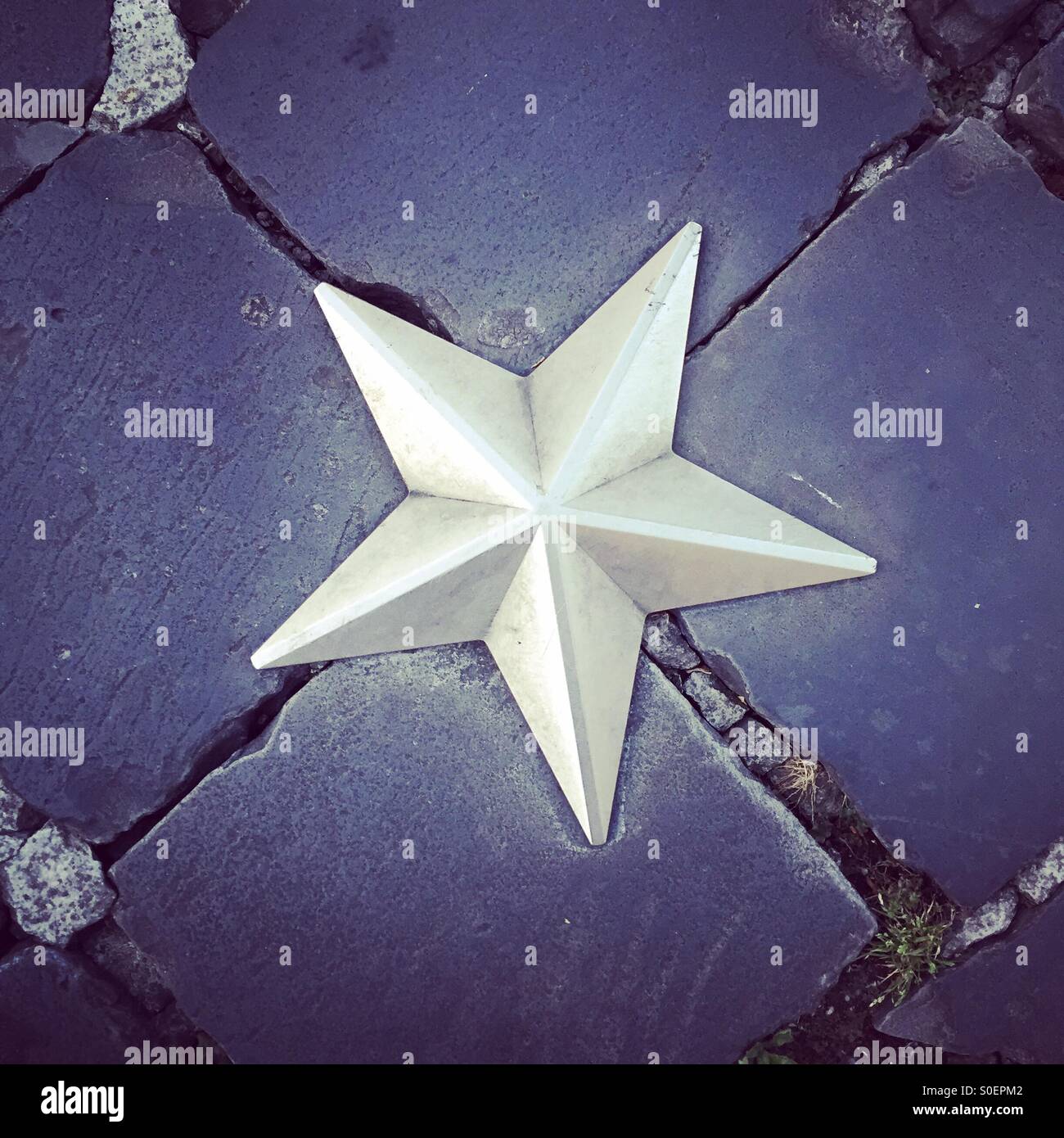 Star in the pavement - Smartphone Captured Stock Image