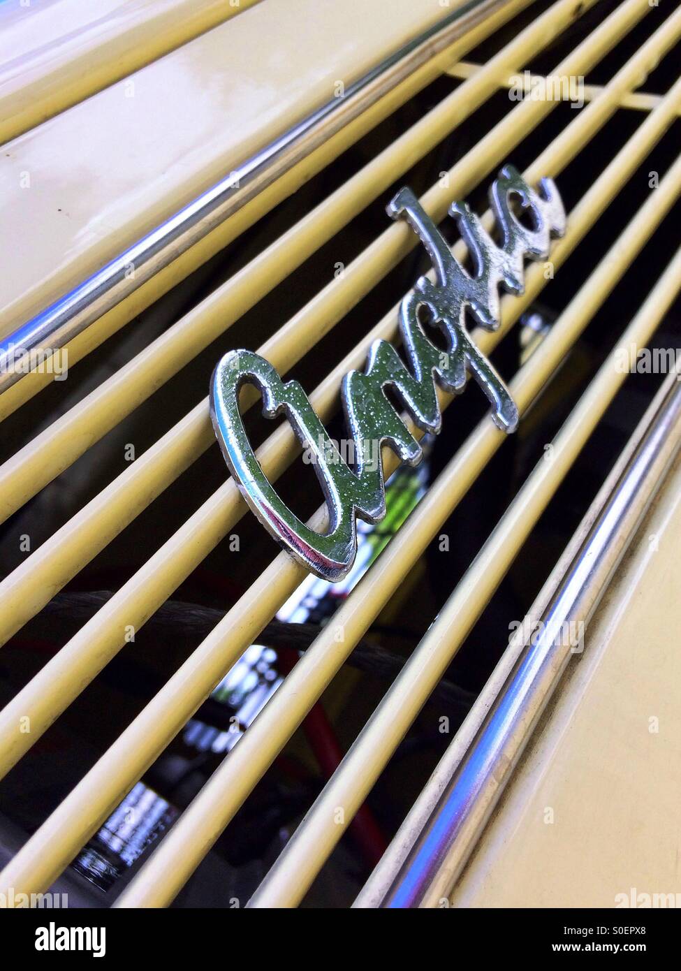 Ford Anglia classic car grill badge Stock Photo Alamy