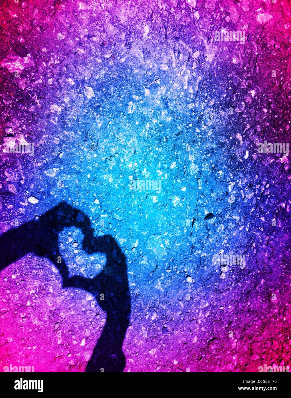 Hands forming heart shape shadow - Smartphone Captured Stock Image