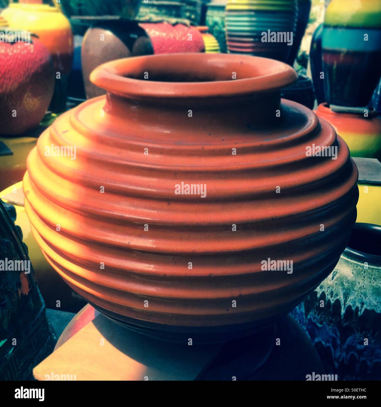 The big orange vase for decorating garden. Stock Photo