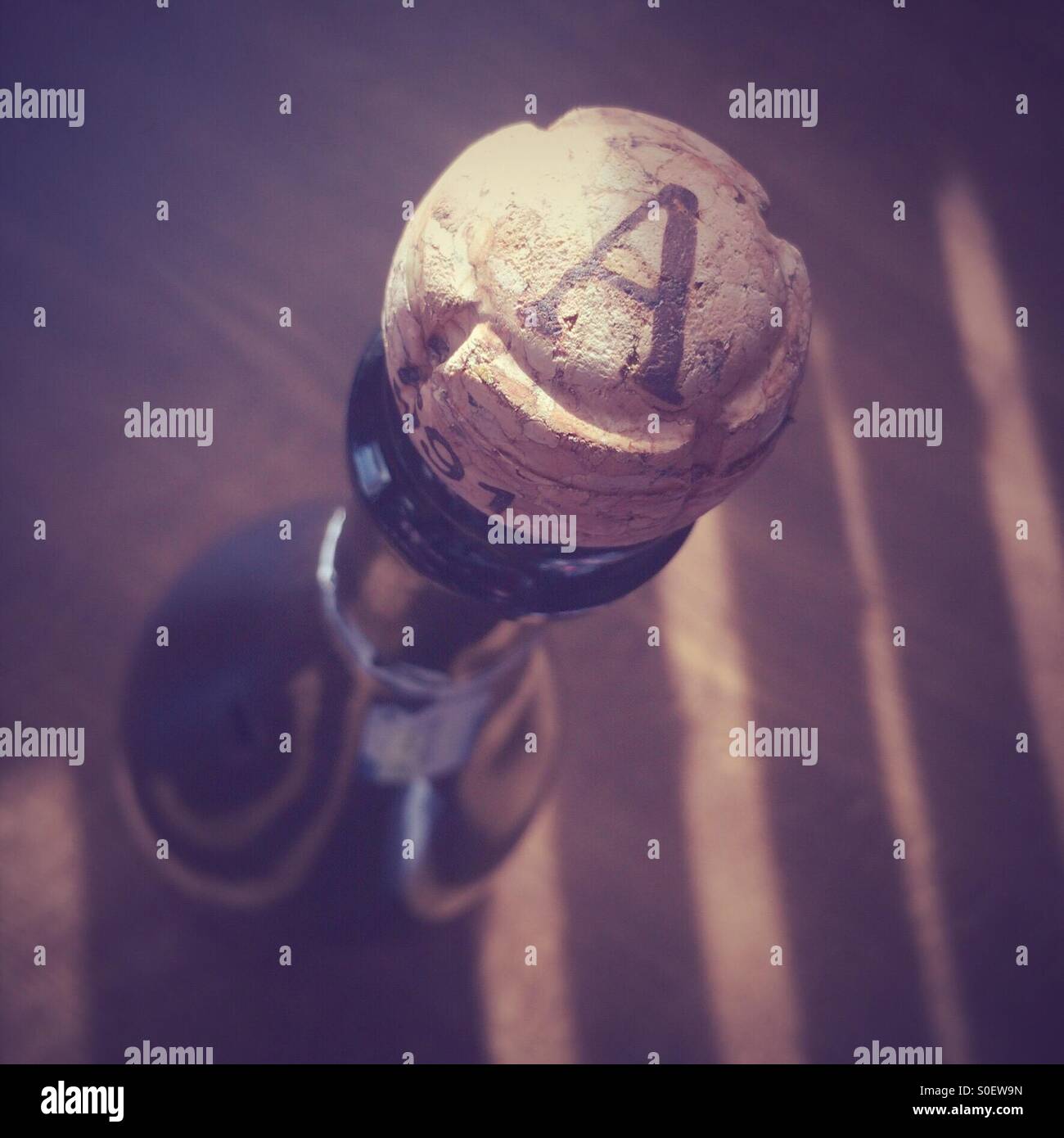 Cork in a bottle of champaign. Top view - Smartphone Captured Stock Image