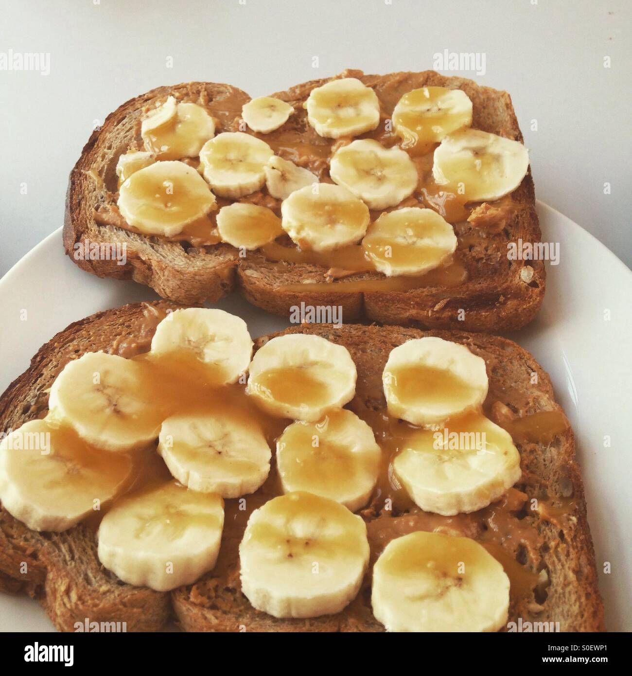 Banana peanut butter toast Stock Photo Alamy