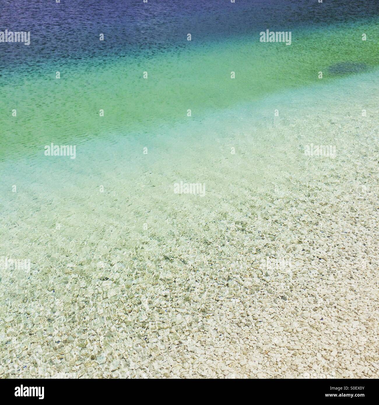 The beautiful water at Antisamos beach on Kefalonia, Greece. - Smartphone Captured Stock Image