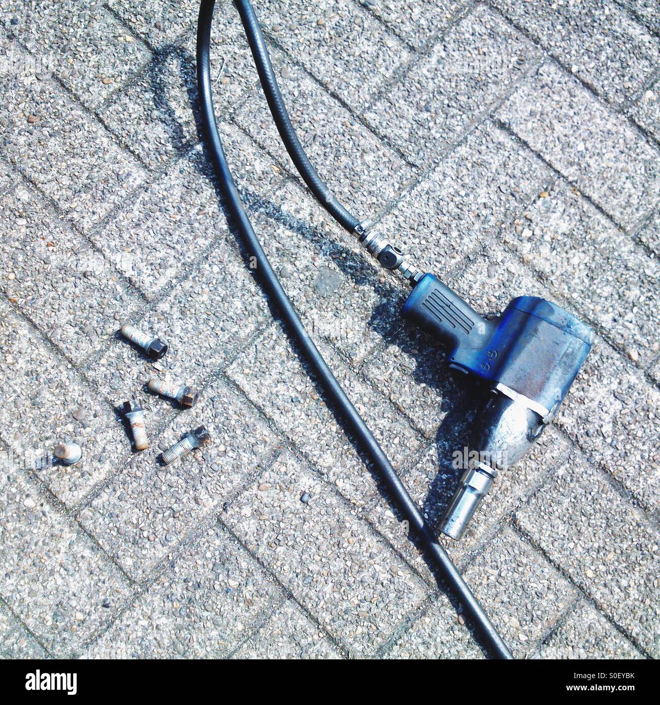 Lug nuts air impact wrench hires stock photography and images Alamy