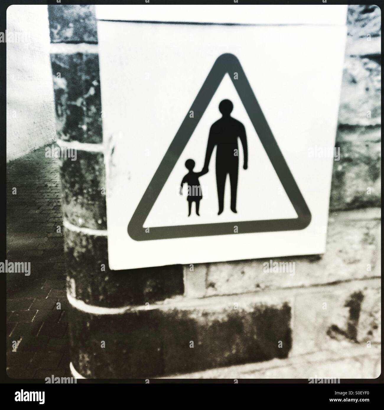 Parent and child warning sign Stock Photo