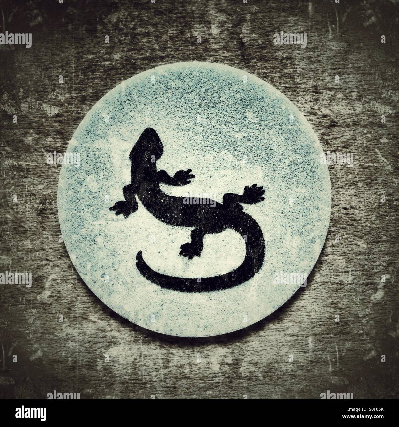 A tongue tattoo of a lizard printed on edible paper for children - Smartphone Captured Stock Image