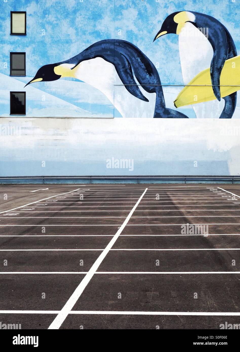 Penguin mural above a car park Stock Photo