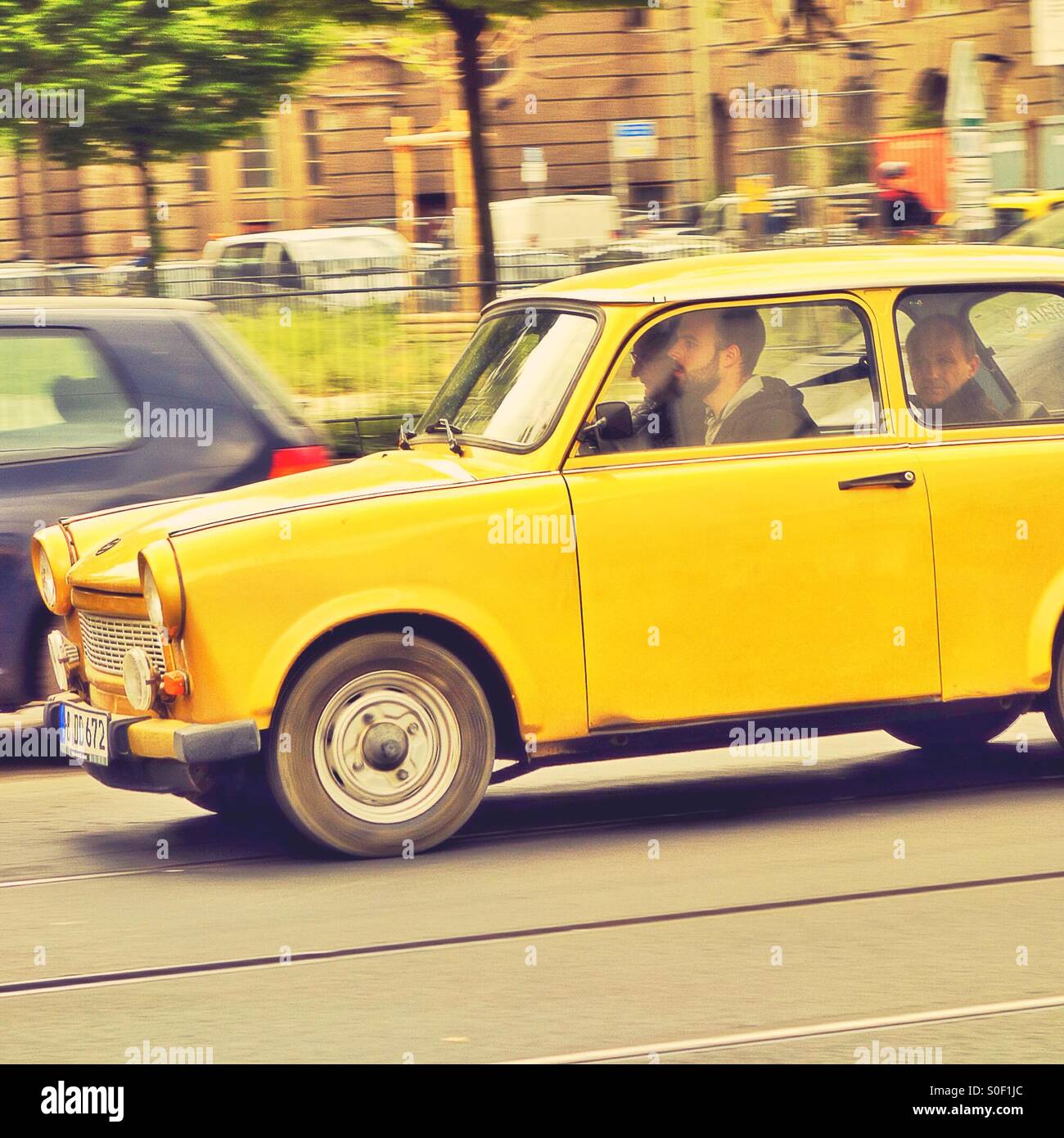 A Trabant car touring Berlin in Germany Stock Photo