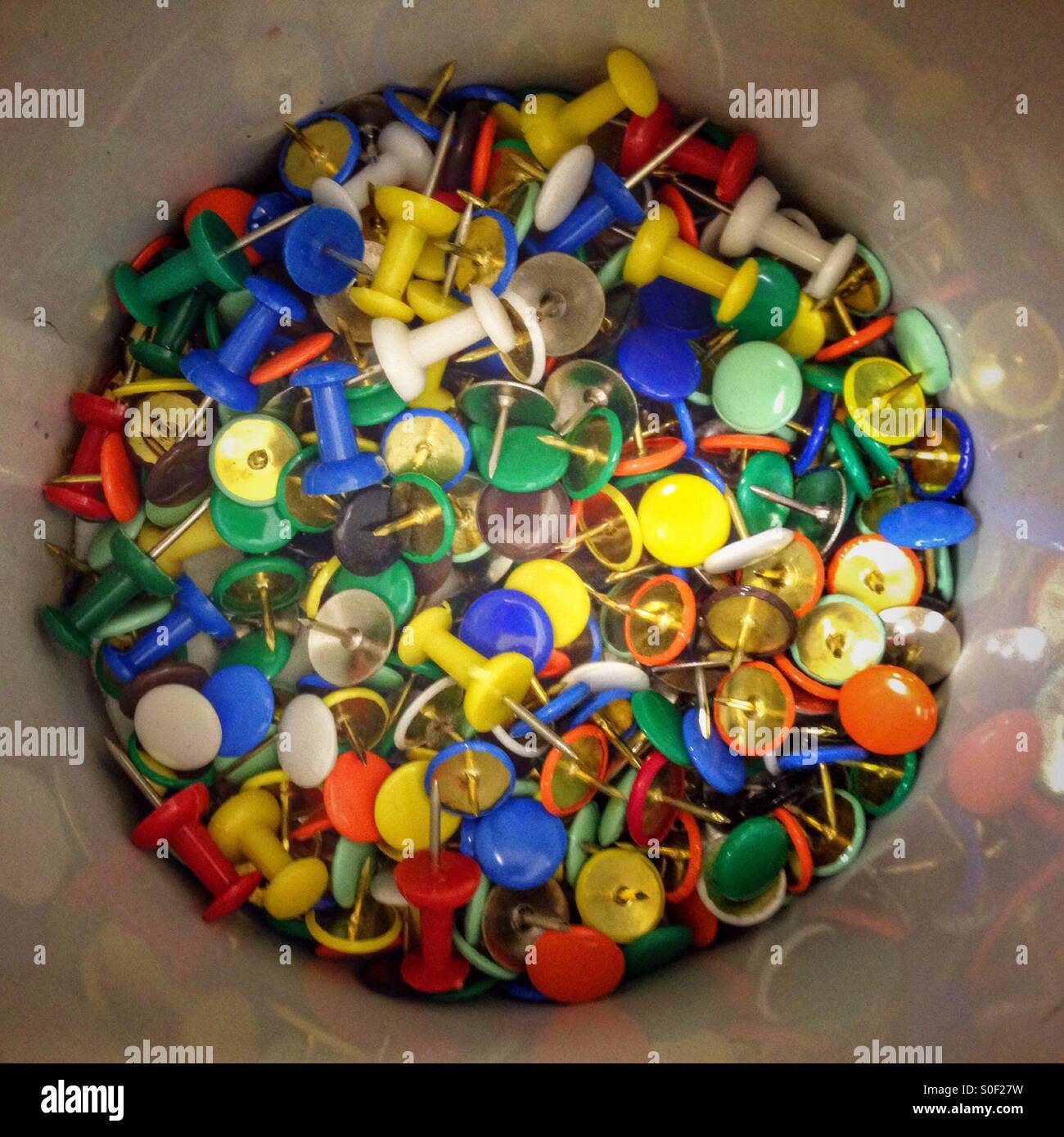 A tin Full of pins Stock Photo Alamy
