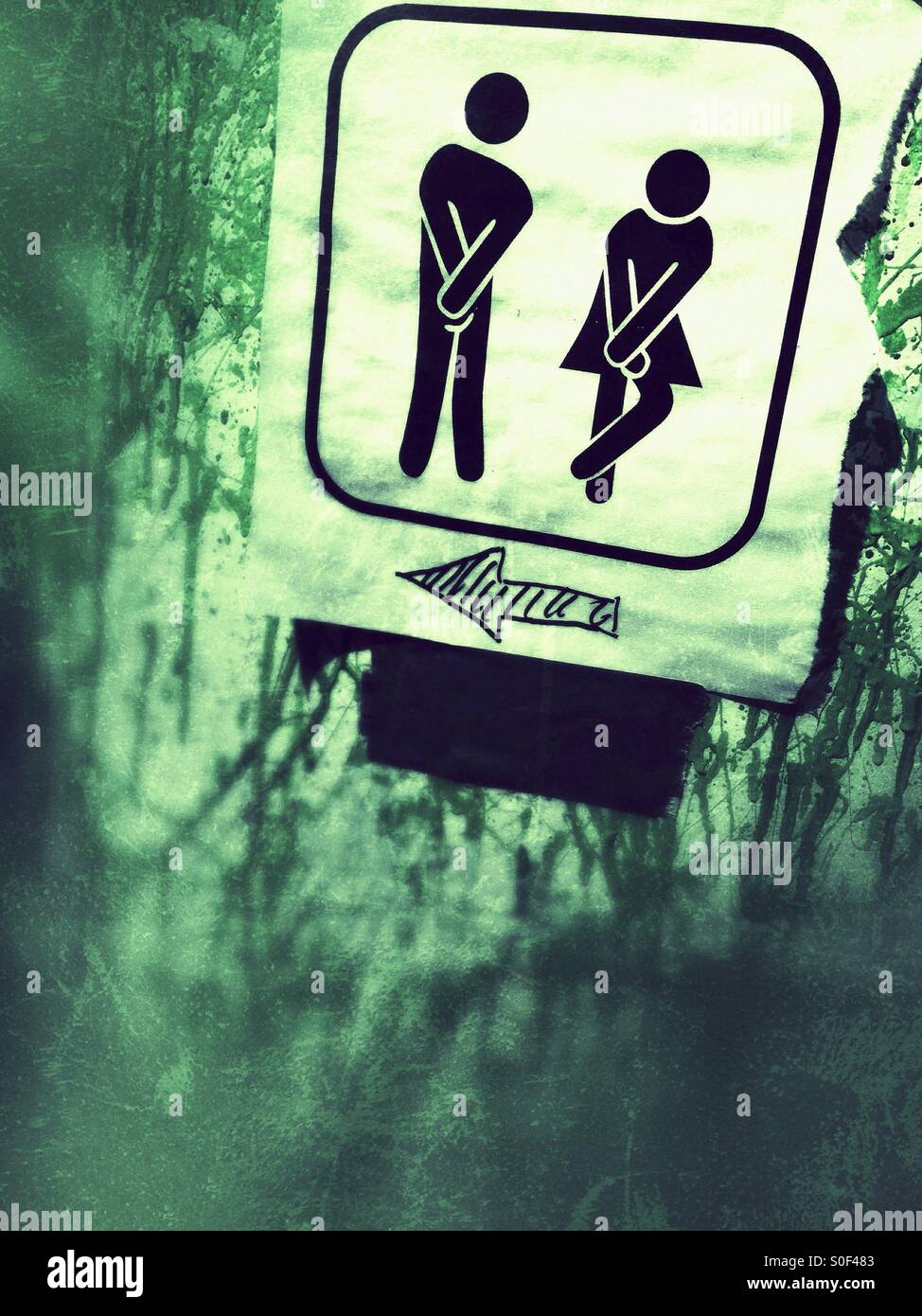 Toilet sign with man and Woman - Smartphone Captured Stock Image