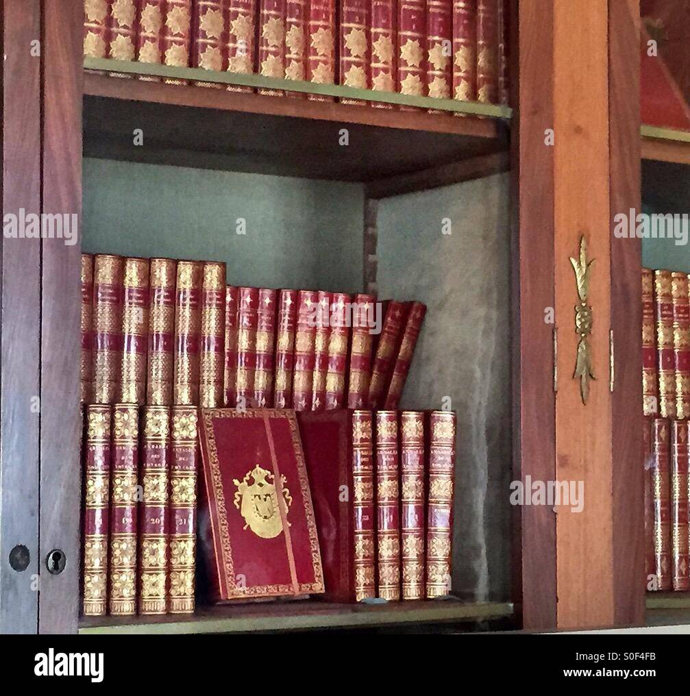 Napoleon Bonaparte's red leather books with insignia at Chateau Malmaison's library Stock Photo