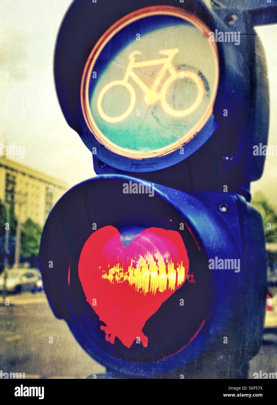 Love Bicycles - a Berlin traffic light with a red heart shape - Smartphone Captured Stock Image