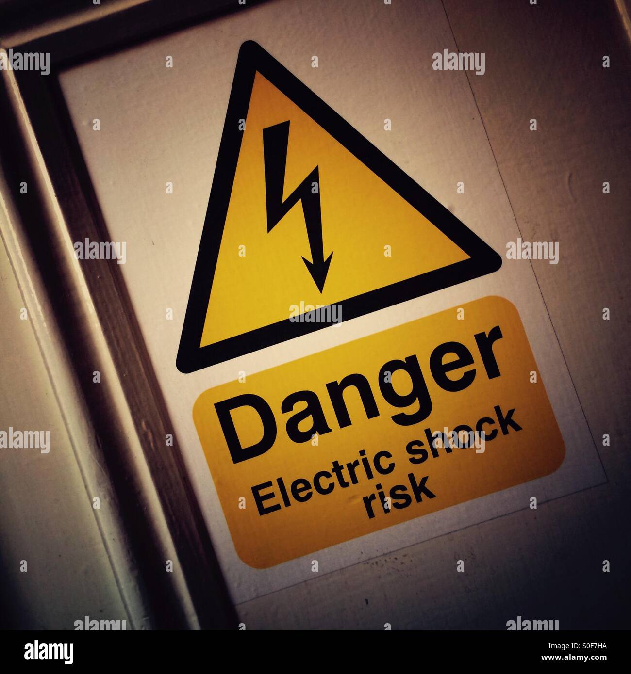 Danger, electric shock risk warning sign Stock Photo