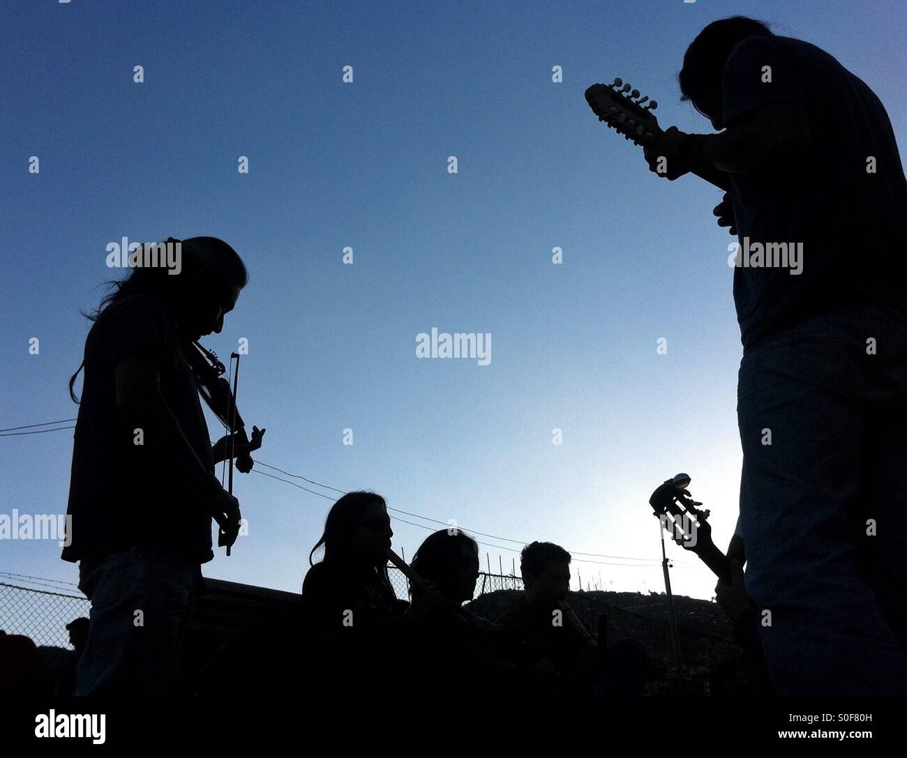 Musicians playing in the streets of Cuzco - Smartphone Captured Stock Image