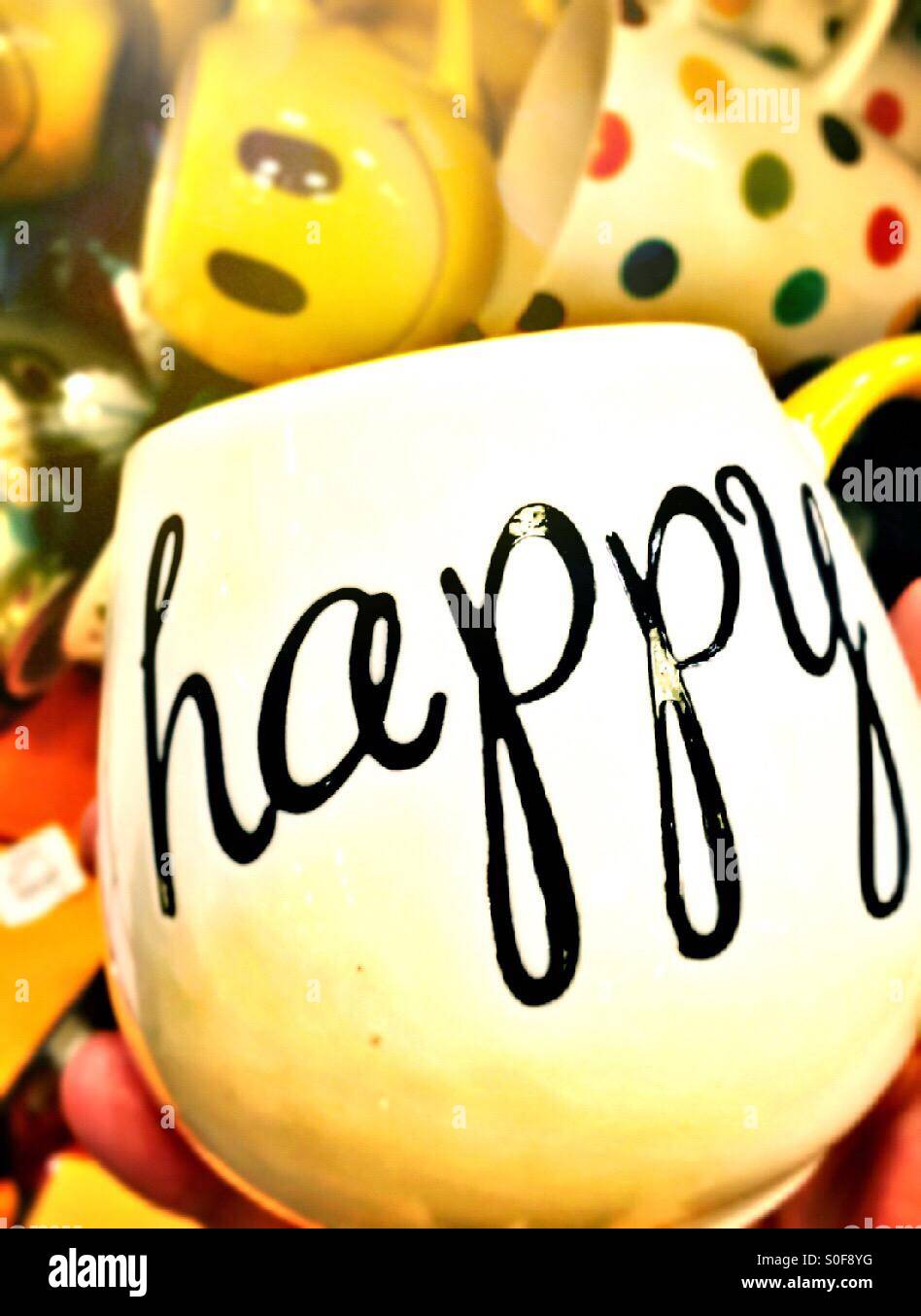 Happy script coffee mug - Smartphone Captured Stock Image