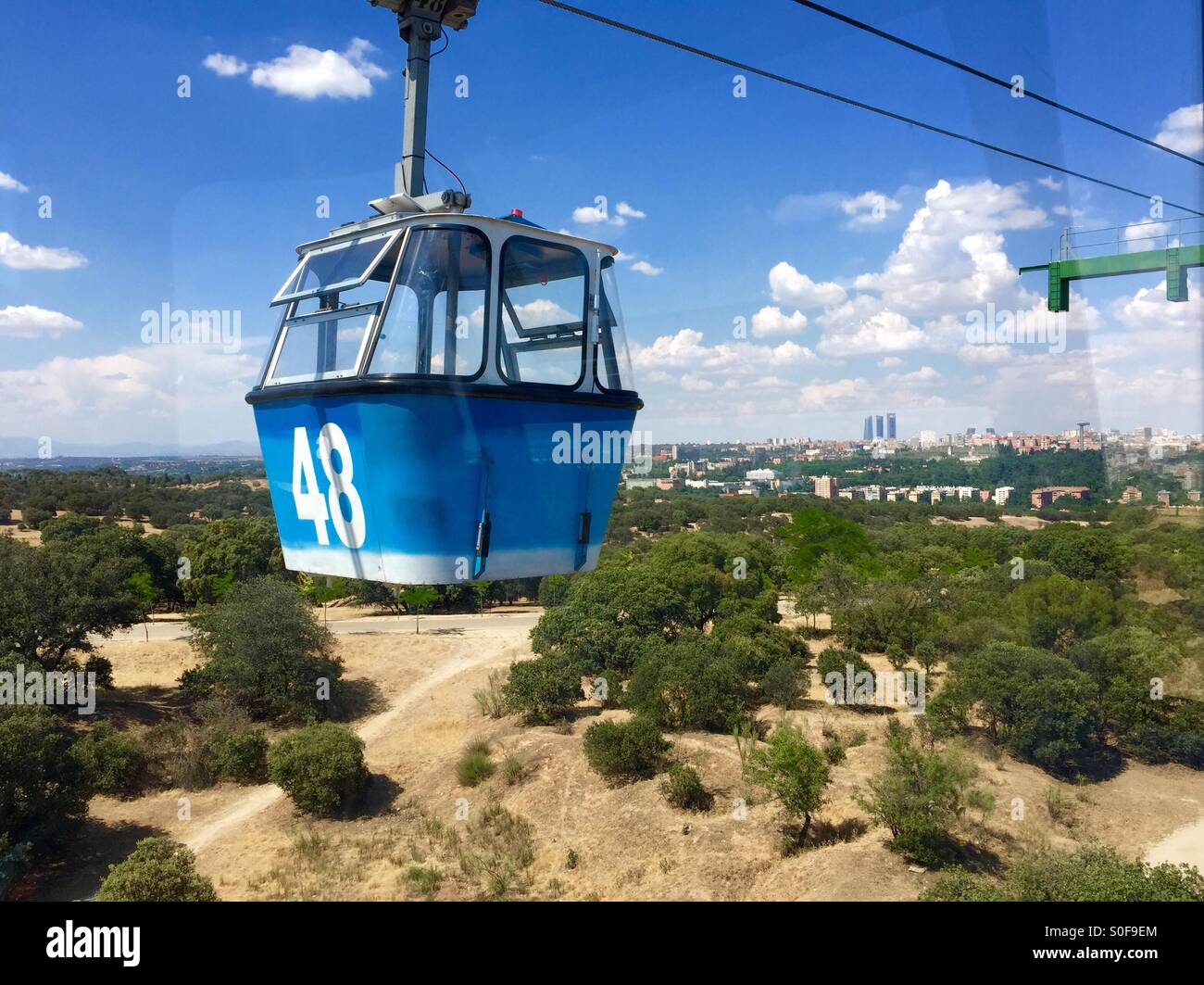 Cable car above the Casa de Campo in Madrid, Spain Stock Photo