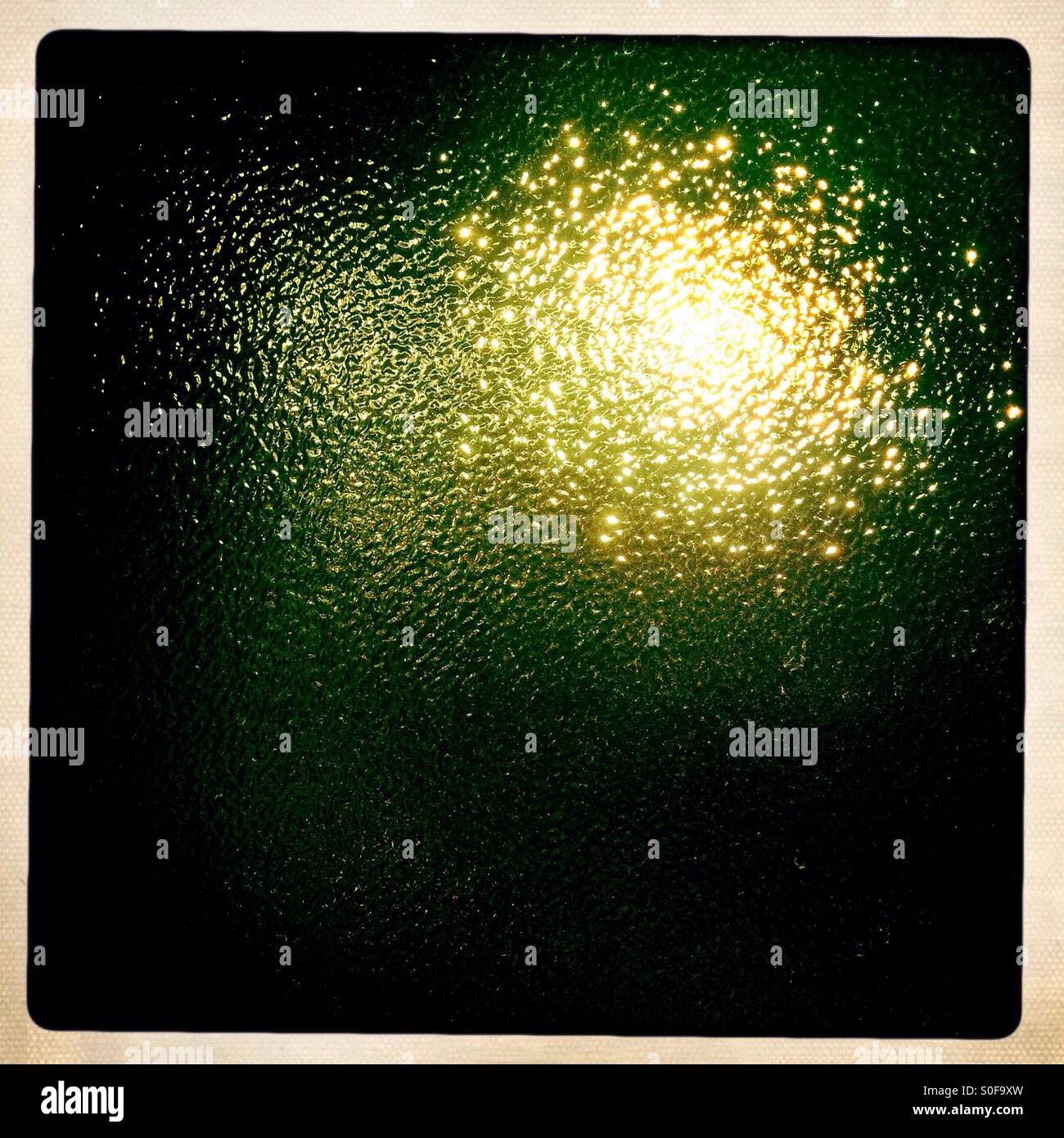 Sun shining through stained Glass - Smartphone Captured Stock Image