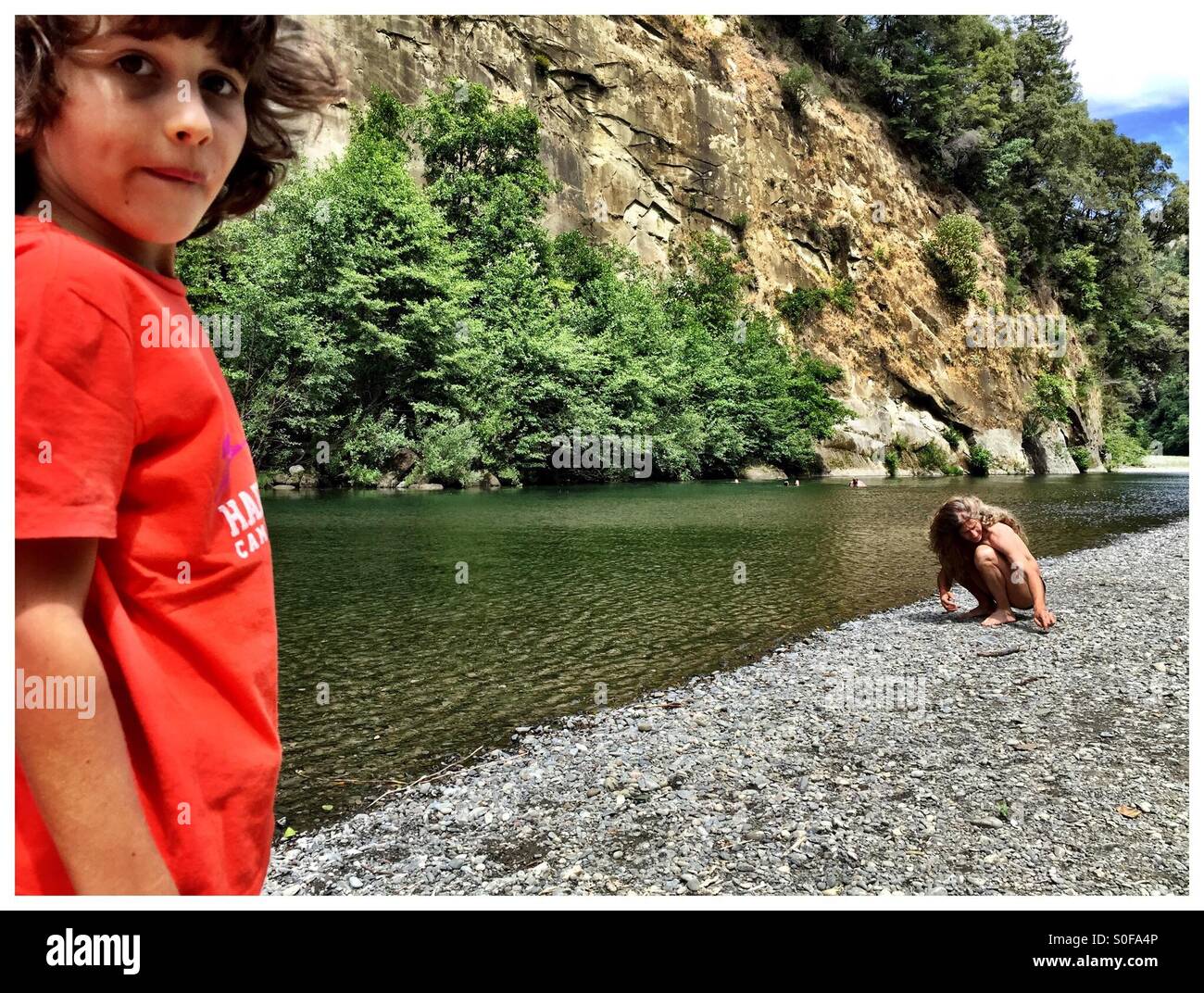 Boy by river hi-res stock photography and images - Alamy