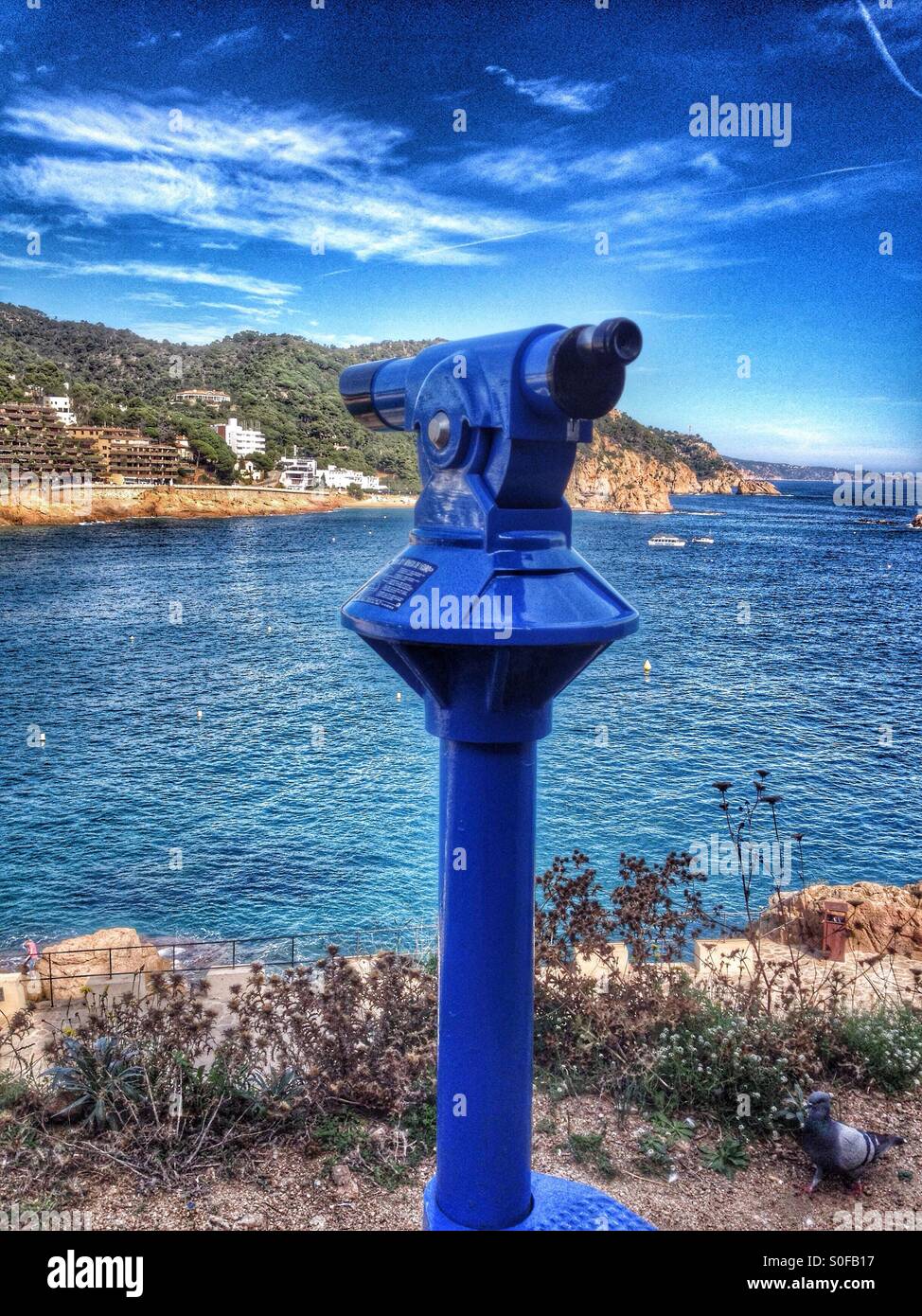 Blue telescope in Tossa de Mar beach - Smartphone Captured Stock Image