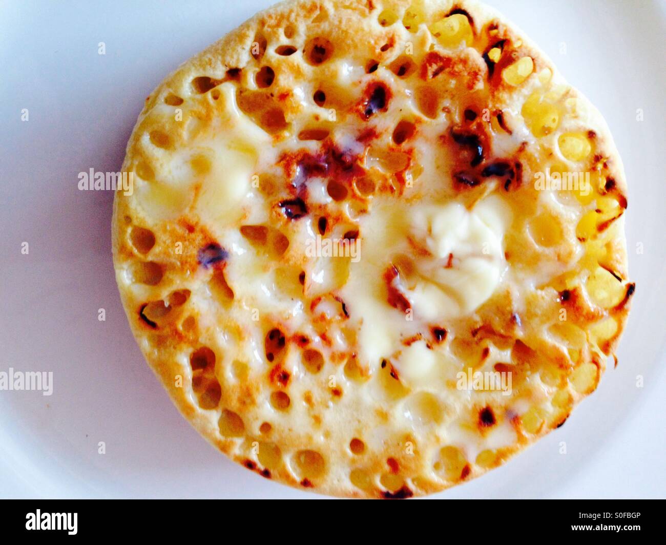 Buttered crumpet - Smartphone Captured Stock Image