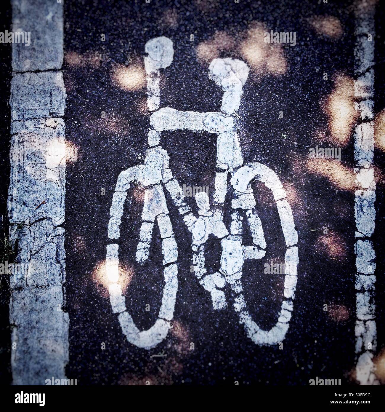 Bicycle icon painted on bicycle lane - Smartphone Captured Stock Image