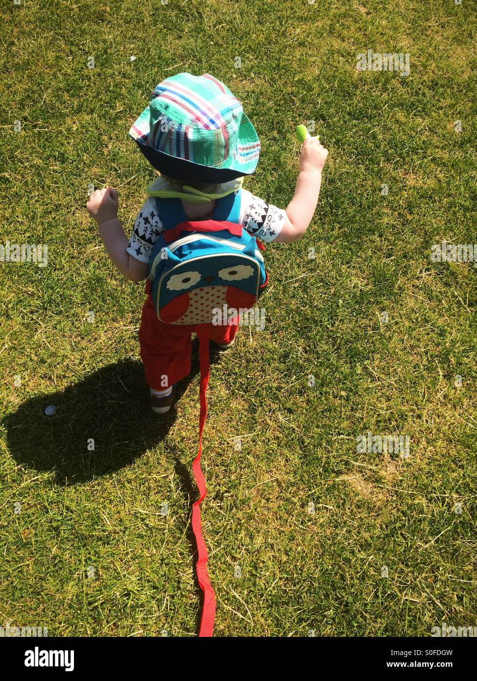 Boy running away hi-res stock photography and images - Alamy
