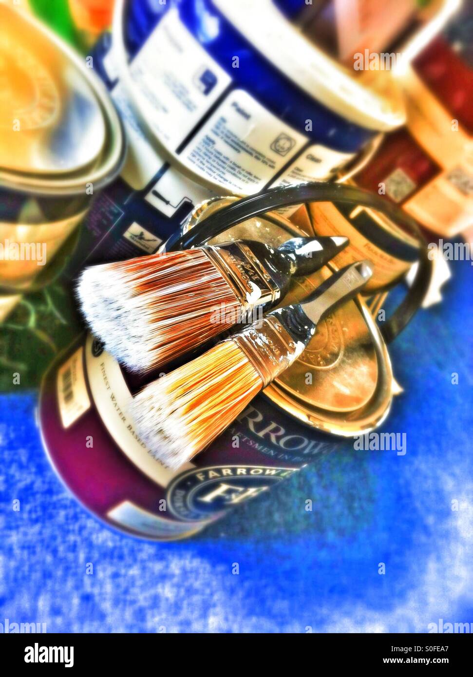 Paint brushes and tins of paint detail - Smartphone Captured Stock Image