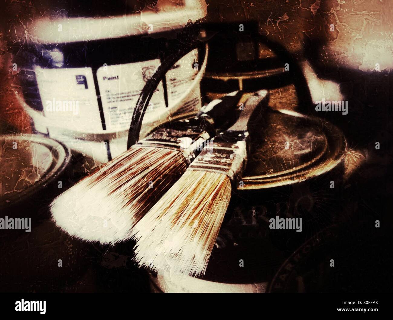Close up of paint brushes on can of paint - Smartphone Captured Stock Image